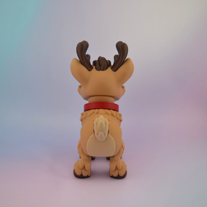 3D printed Christmas reindeer with big brown eyes, a bright red nose, brown antlers and a red collar with a golden bell.